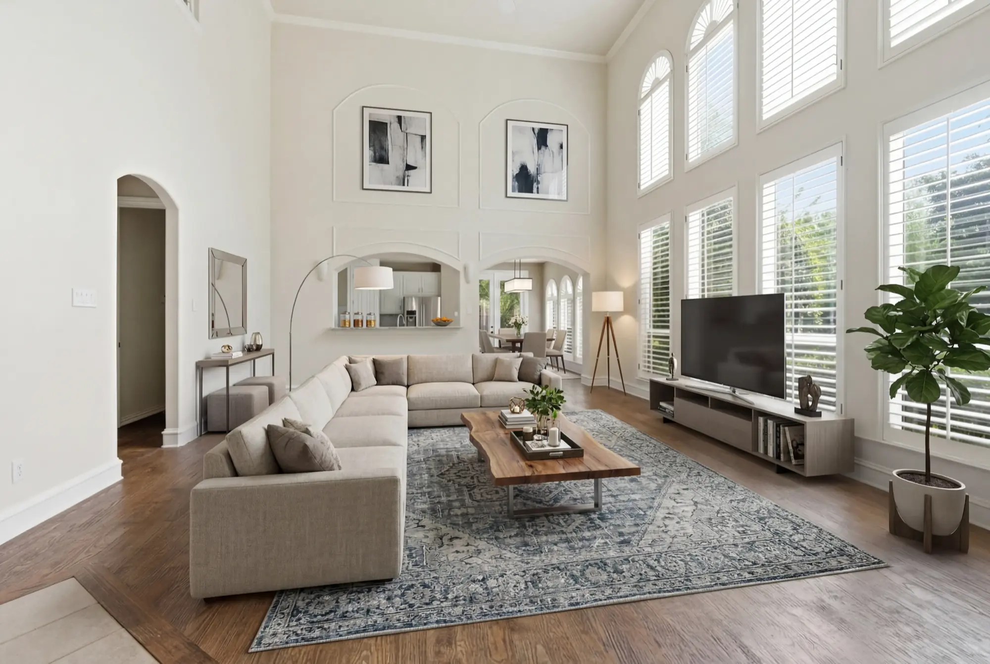Grand living room with two-story windows